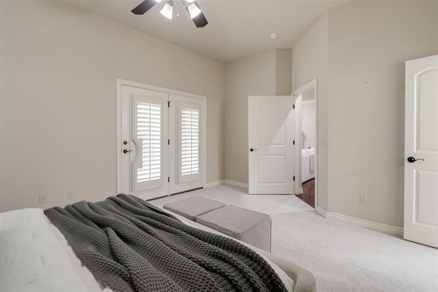 bedroom with ceiling fan, access to outside, light colored carpet, and baseboards