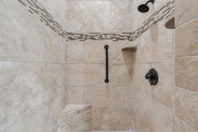 room details featuring tiled shower