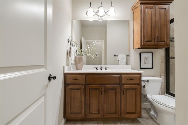 full bath featuring tile patterned floors, toilet, a shower, and vanity