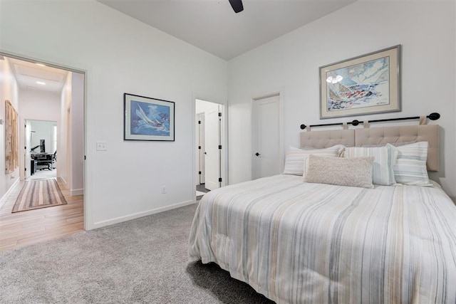 bedroom featuring ceiling fan, baseboards, and carpet floors