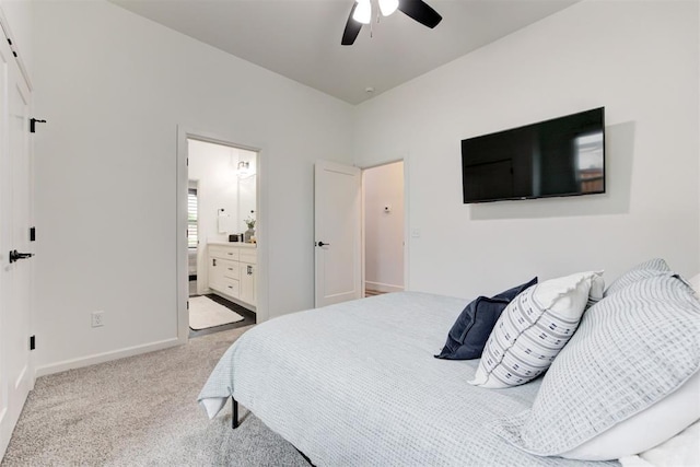 bedroom featuring carpet flooring, ceiling fan, connected bathroom, and baseboards