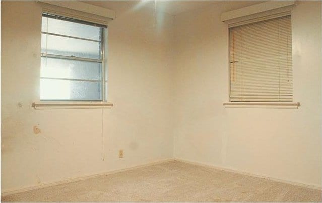 107 S 10th St, Davis, OK 73030 - spare room with carpet and baseboards