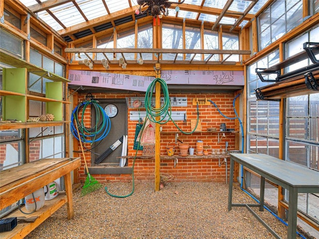 725 NE 15th St, Oklahoma City, OK 73104 - exterior space featuring high vaulted ceiling, a ceiling fan, and brick wall