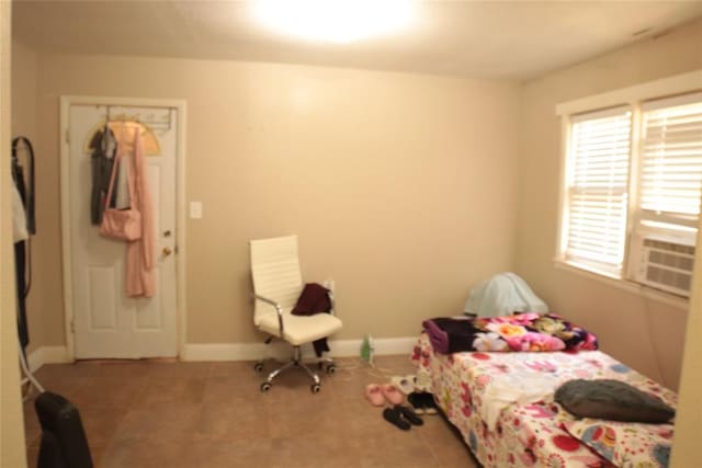 607 E Liveoak St, Altus, OK 73521 - tiled bedroom with baseboards