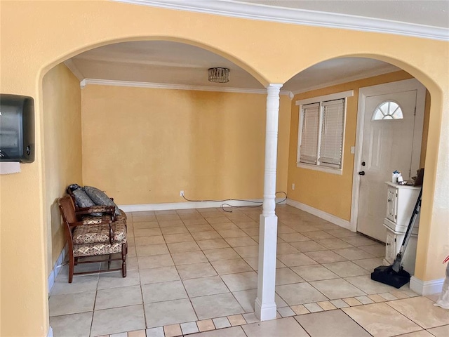 607 E Liveoak St, Altus, OK 73521 - entryway featuring ornamental molding, light tile patterned flooring, and arched walkways