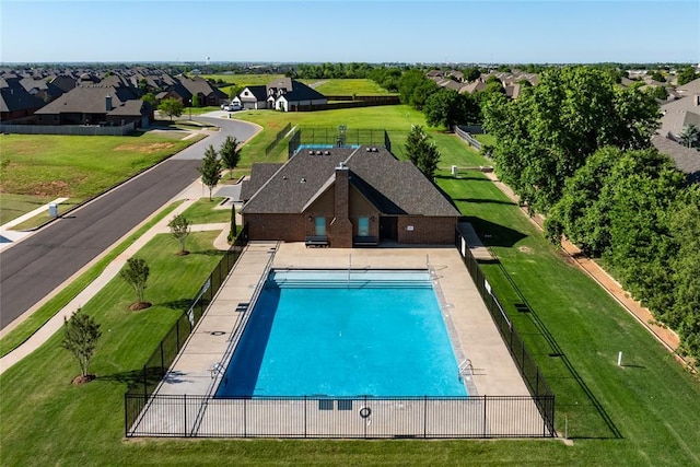 10809 NW 27th St, Yukon, OK 73099 - community pool featuring a residential view