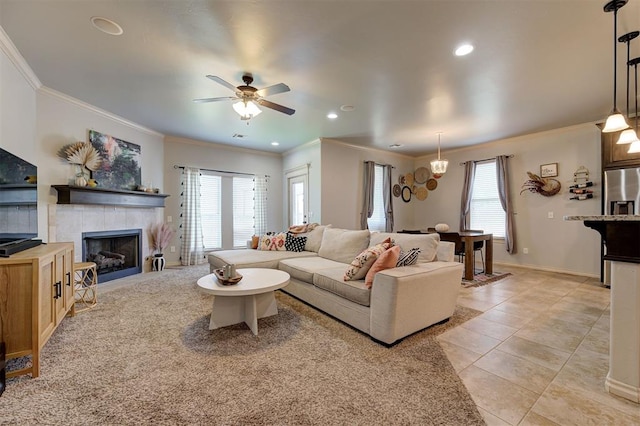 15808 Cantera Creek Dr, Edmond, OK 73013 - living room with ceiling fan, baseboards, recessed lighting, ornamental molding, and a fireplace