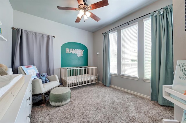 15808 Cantera Creek Dr, Edmond, OK 73013 - carpeted bedroom featuring ceiling fan, a nursery area, and baseboards