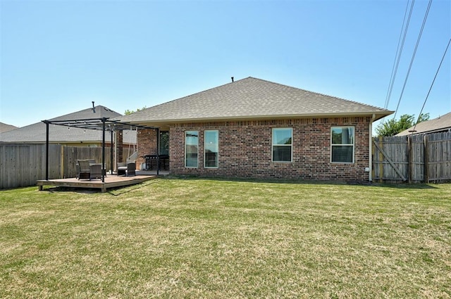 15808 Cantera Creek Dr, Edmond, OK 73013 - rear view of house featuring a deck, a yard, a fenced backyard, and brick siding