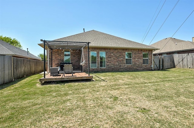 15808 Cantera Creek Dr, Edmond, OK 73013 - back of house with a pergola, a deck, a fenced backyard, and brick siding