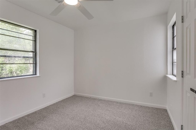 1437 SW 34th St, Oklahoma City, OK 73119 - spare room featuring plenty of natural light, carpet, and a ceiling fan