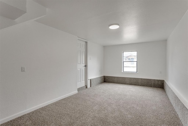1437 SW 34th St, Oklahoma City, OK 73119 - spare room featuring baseboards and carpet