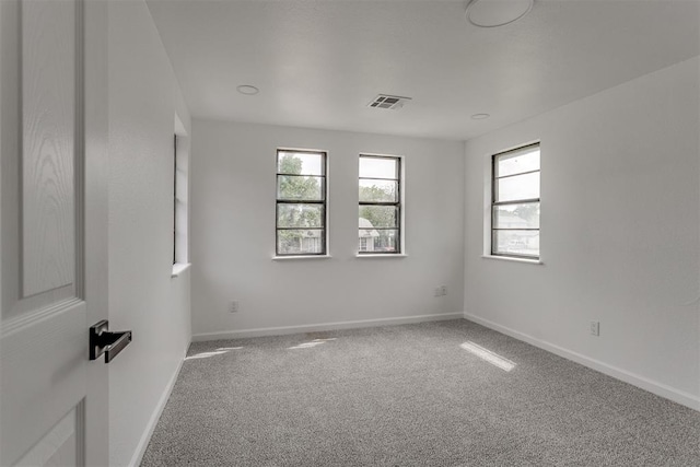1437 SW 34th St, Oklahoma City, OK 73119 - carpeted empty room featuring visible vents and baseboards