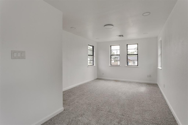 1437 SW 34th St, Oklahoma City, OK 73119 - unfurnished room featuring baseboards, carpet, and visible vents