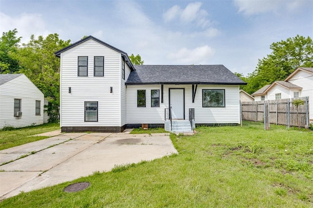 1437 SW 34th St, Oklahoma City, OK 73119 - rear view of house featuring fence, a patio, a shingled roof, and a lawn