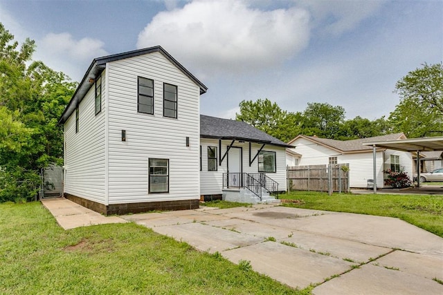 1437 SW 34th St, Oklahoma City, OK 73119 - back of property with a lawn, fence, and a shingled roof