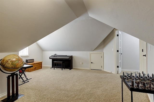 2051 Vaquero Ct, Edmond, OK 73034 - interior space featuring vaulted ceiling, carpet floors, and baseboards
