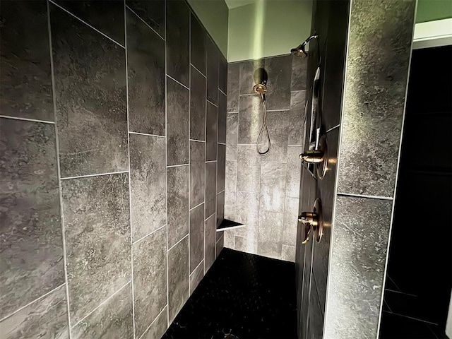 full bathroom with tiled shower