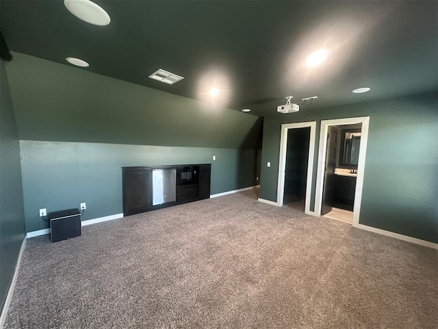 4140 Peony Cir, Piedmont, OK 73078 - additional living space with carpet and vaulted ceiling