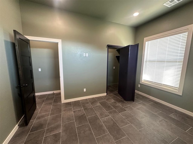4140 Peony Cir, Piedmont, OK 73078 - unfurnished bedroom featuring baseboards and recessed lighting