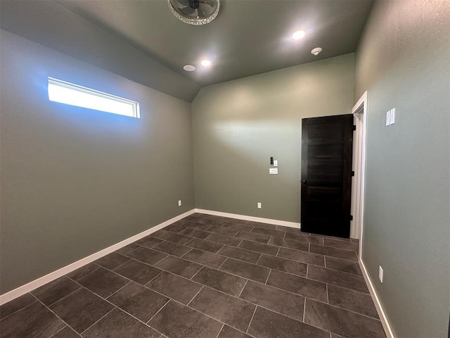 4140 Peony Cir, Piedmont, OK 73078 - unfurnished room featuring vaulted ceiling, dark tile patterned floors, a smoke detector, and recessed lighting