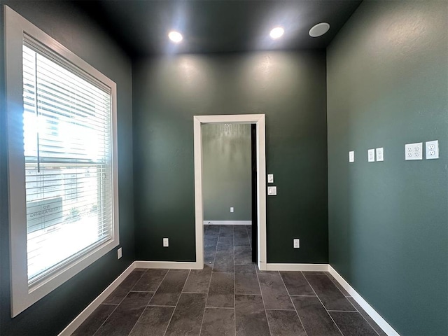 4140 Peony Cir, Piedmont, OK 73078 - unfurnished room featuring dark tile patterned floors and recessed lighting