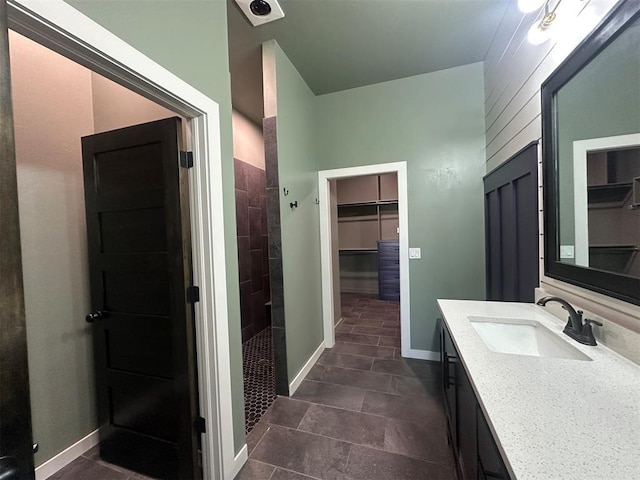 4140 Peony Cir, Piedmont, OK 73078 - full bath featuring vanity, a walk in closet, and tiled shower