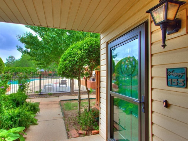 property entrance featuring fence