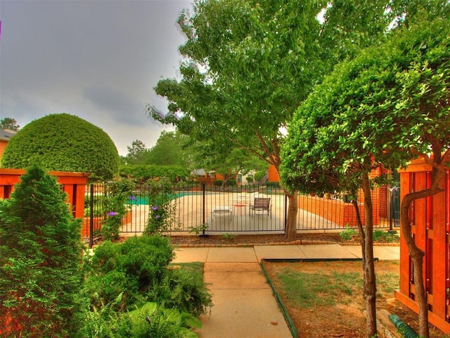 view of gate featuring fence