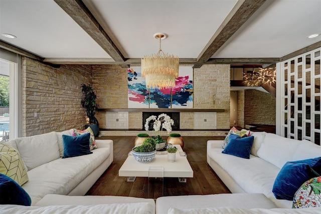 living area with wood-type flooring, beamed ceiling, and a notable chandelier