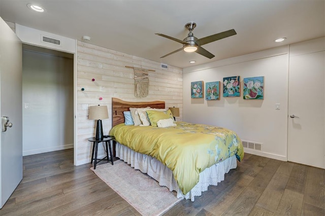 bedroom featuring visible vents, recessed lighting, and wood finished floors