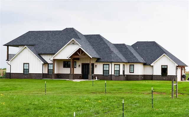 1330 County St Unit 2927, Tuttle, OK 73089 - modern farmhouse style home featuring board and batten siding, a front yard, and roof with shingles