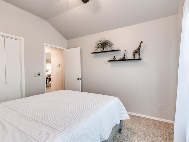 bedroom with carpet floors, baseboards, vaulted ceiling, and ceiling fan