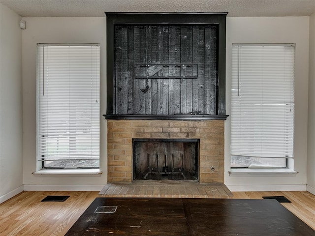 3800 Southwind Ct, Oklahoma City, OK 73179 - detailed view of a fireplace and wood finished floors