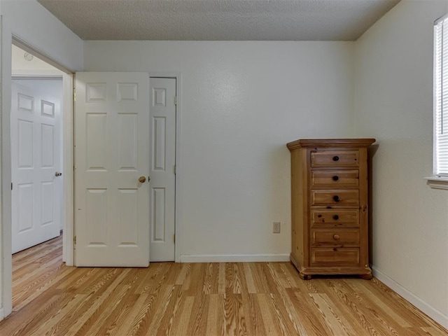 3800 Southwind Ct, Oklahoma City, OK 73179 - unfurnished bedroom featuring light wood finished floors and baseboards