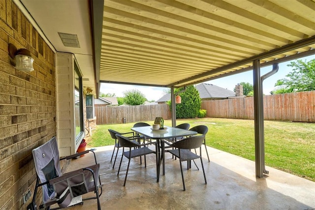 7904 NW 81st St, Oklahoma City, OK 73132 - view of patio / terrace featuring outdoor dining space and a fenced backyard