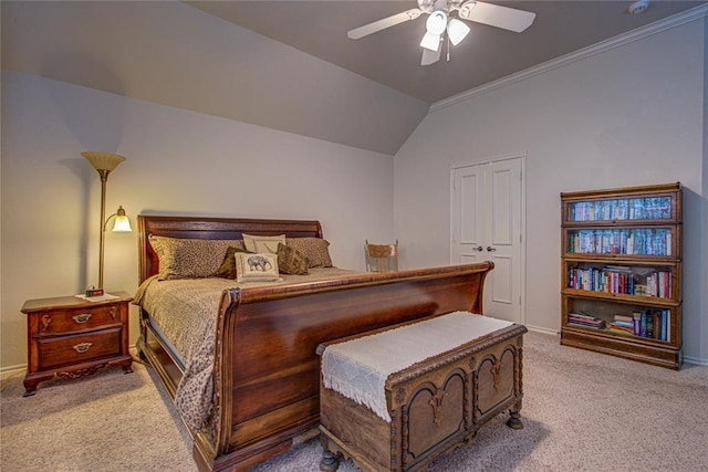 carpeted bedroom with crown molding, baseboards, ceiling fan, and lofted ceiling