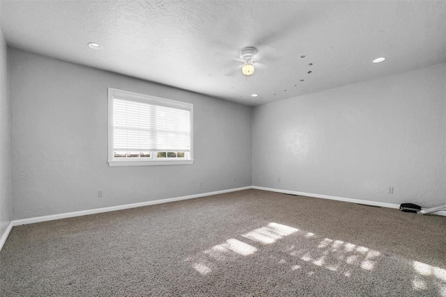 unfurnished room with baseboards, recessed lighting, a ceiling fan, and carpet