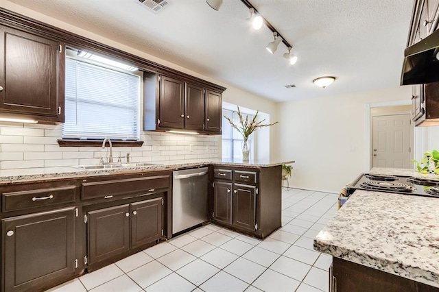 kitchen featuring light tile patterned floors, tasteful backsplash, visible vents, a peninsula, and stainless steel dishwasher