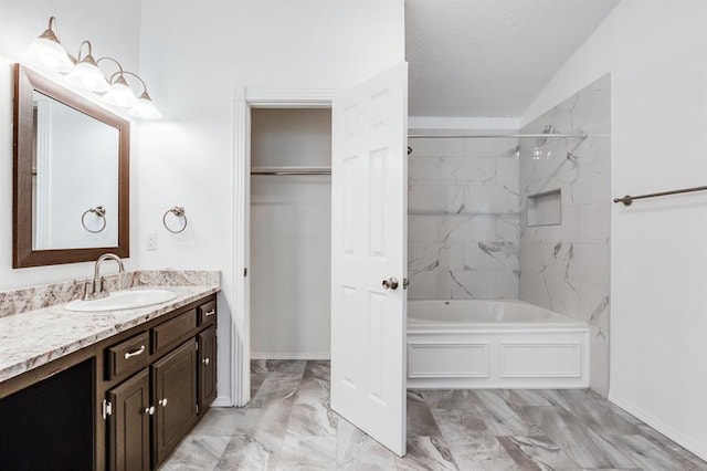 bathroom with marble finish floor, shower / tub combination, vanity, and baseboards