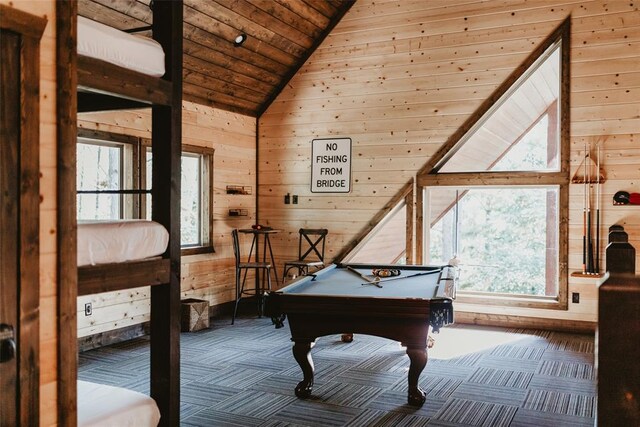 rec room with carpet flooring, wood walls, pool table, lofted ceiling, and wood ceiling