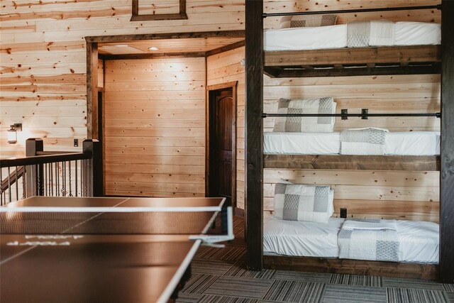 unfurnished bedroom with wood walls