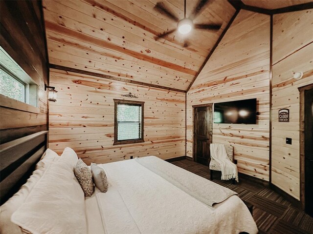 bedroom featuring baseboards, wood walls, high vaulted ceiling, and wooden ceiling