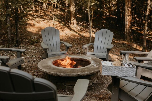 view of patio / terrace with a fire pit