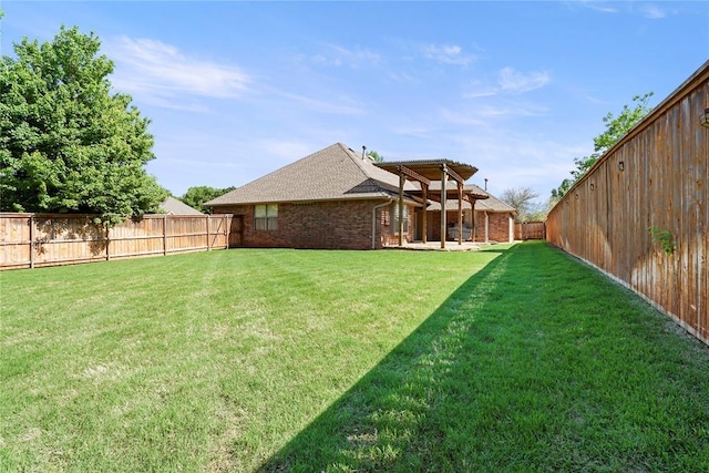 view of yard featuring a fenced backyard and a patio area