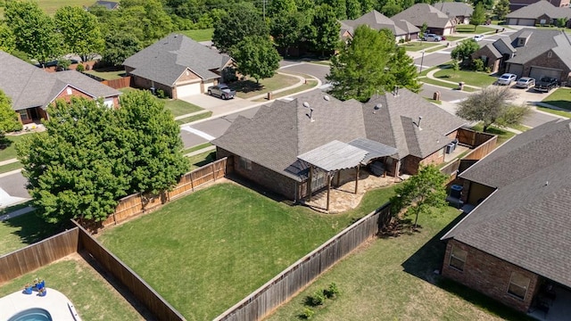 birds eye view of property with a residential view