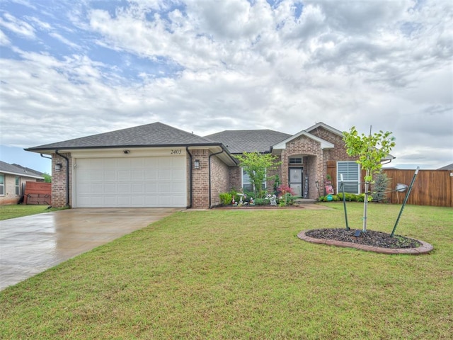 ranch-style house featuring a front lawn, brick siding, concrete driveway, an attached garage, and fence