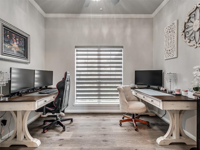 office space featuring baseboards, wood finished floors, a ceiling fan, and ornamental molding