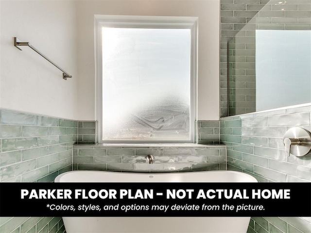 4120 Blue Ridge Ave, Newcastle, OK 73065 - bathroom with a soaking tub and tile walls