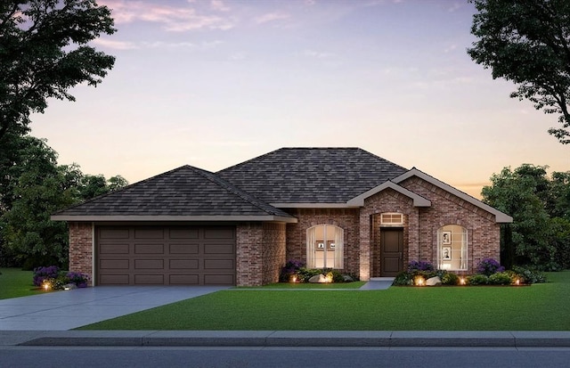 18324 Austin Ct, Edmond, OK 73012 - ranch-style home featuring concrete driveway, a yard, an attached garage, and brick siding